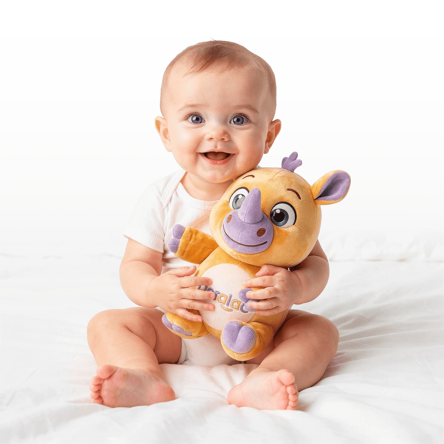 Bebé Doralac con su mascota de peluche
